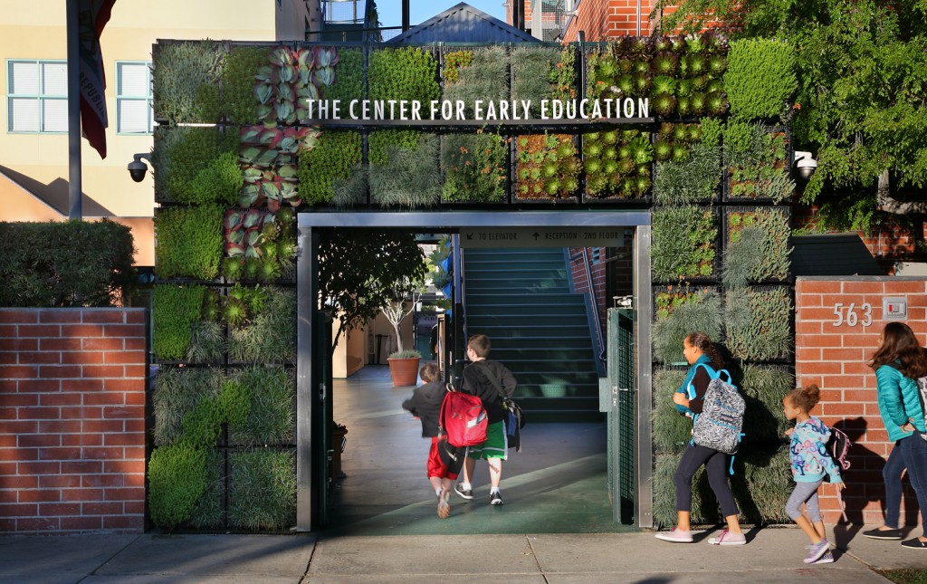 An entranceway design incorporates a living wall. 