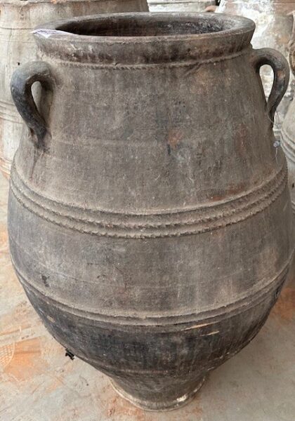 vintage Greek Pithari oil jar with a dark natural patina