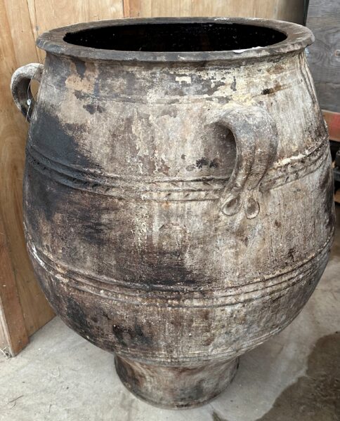 vintage Greek Pithari oil jar with a dark natural patina