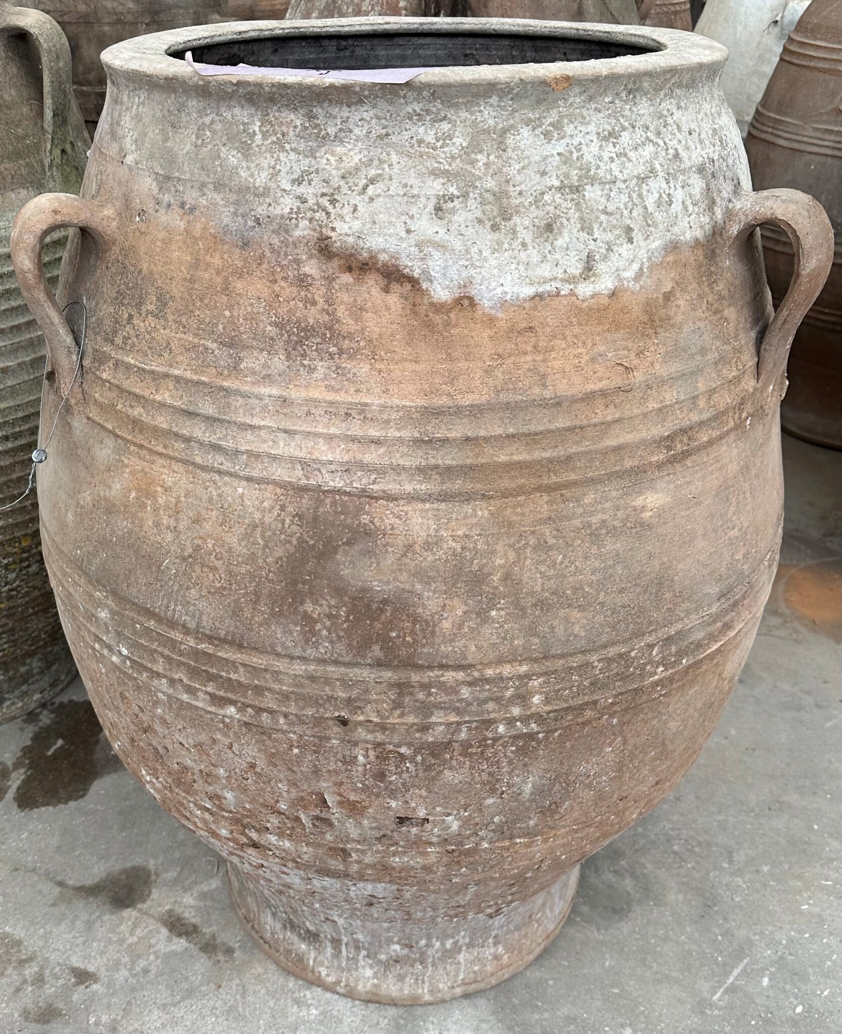 vintage Greek Pithari oil jar with a white wash finish and natural patina