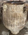 vintage Greek Pithari oil jar with a dark natural patina and white drips