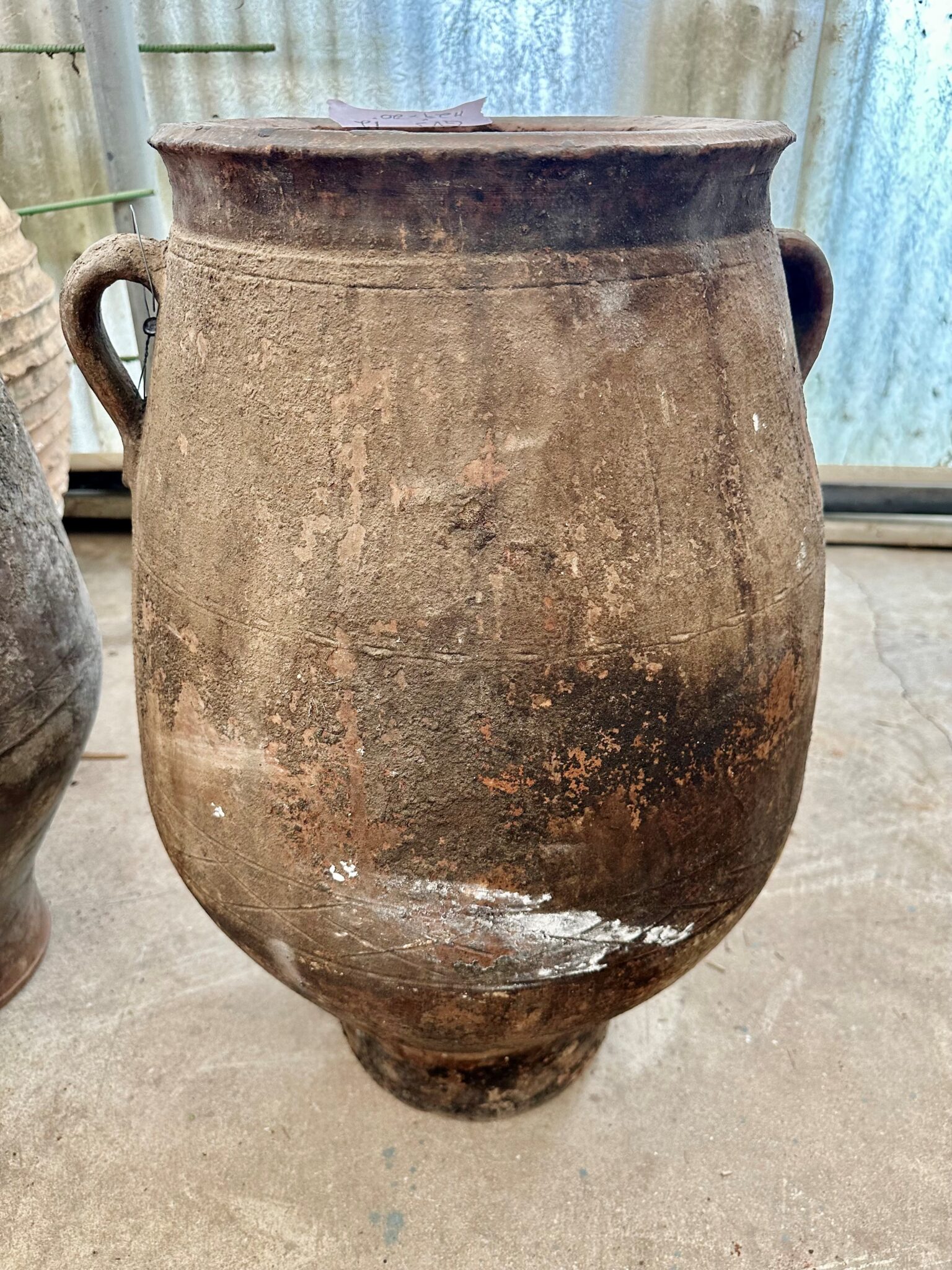 vintage Greek Pithari oil jar with a dark natural patina