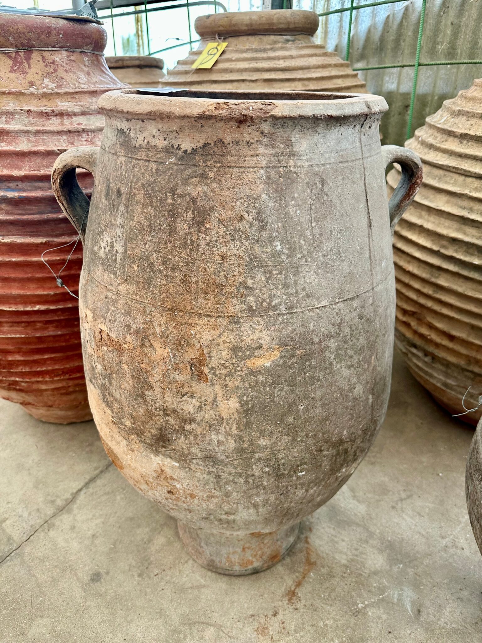 vintage Greek Pithari oil jar with a gray natural patina