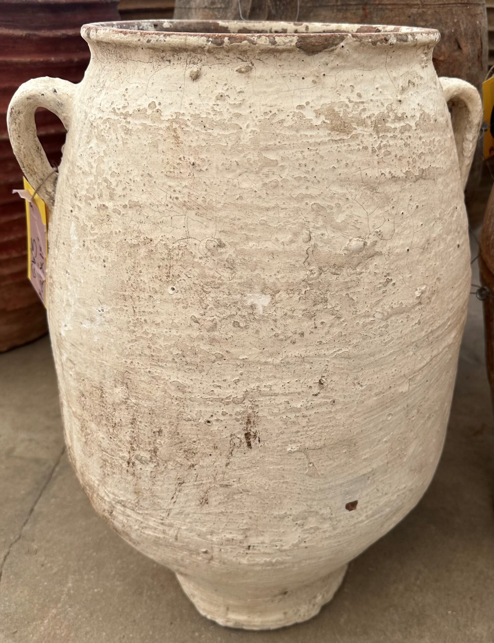 vintage Greek Pithari oil jar with a white wash finish and natural patina
