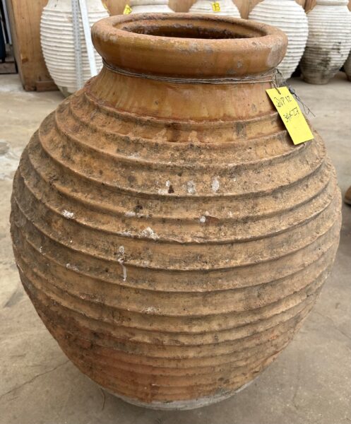 vintage Greek Peloponesian oil jar with a weathered patina