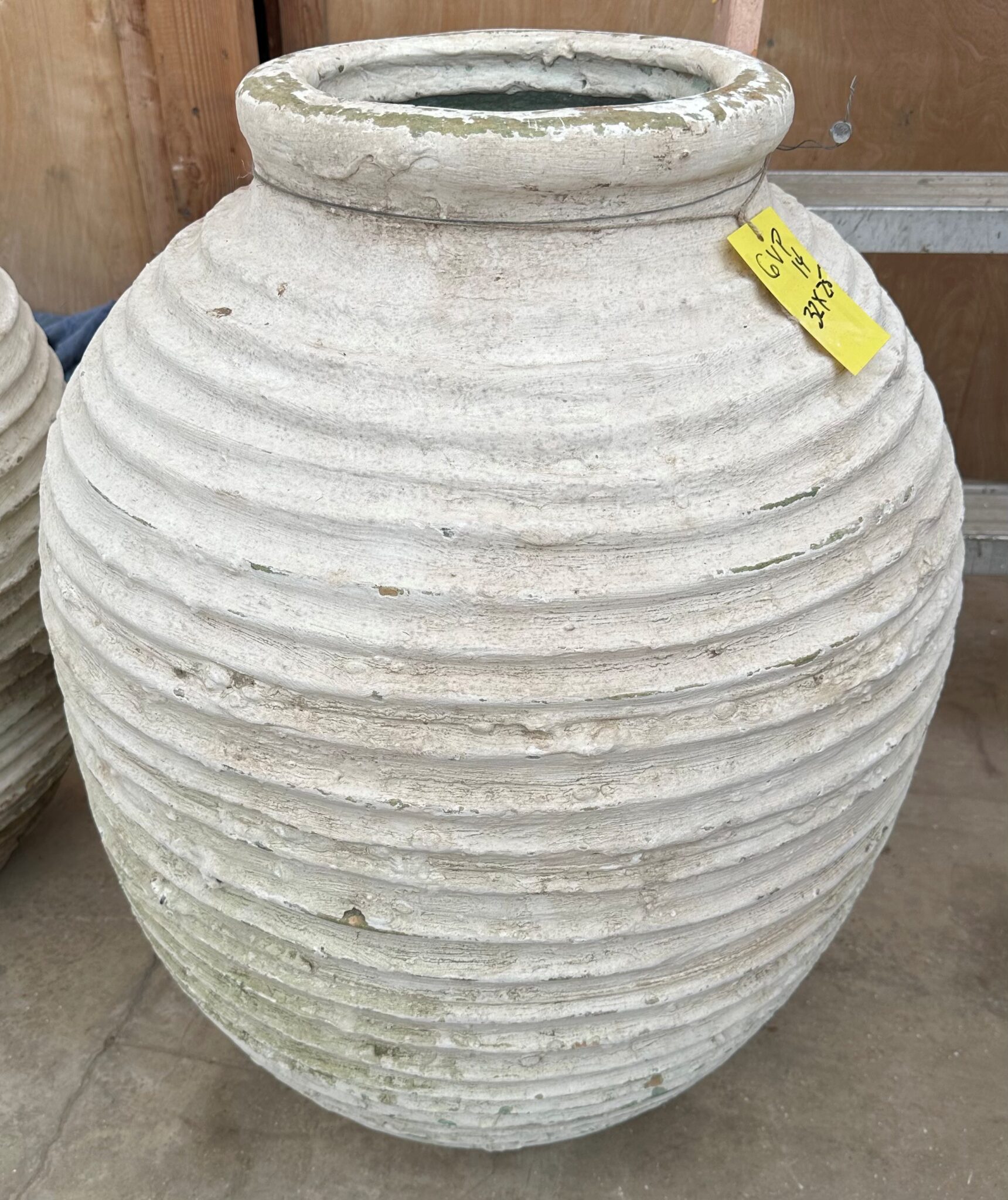 vintage Greek Peloponesian oil jar with a lightly weathered white wash surfaced