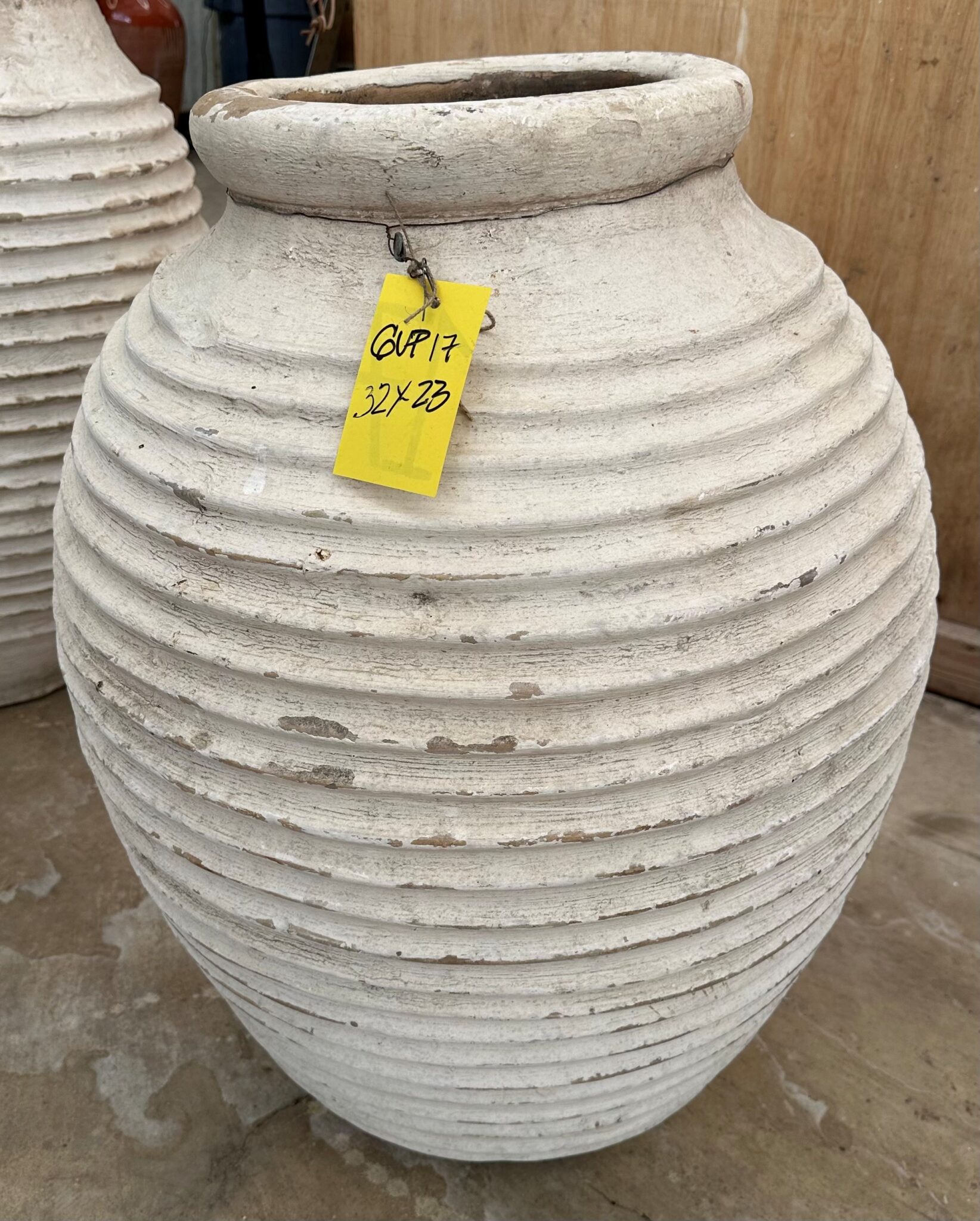 vintage Greek Peloponesian oil jar with a lightly weathered white wash surfaced