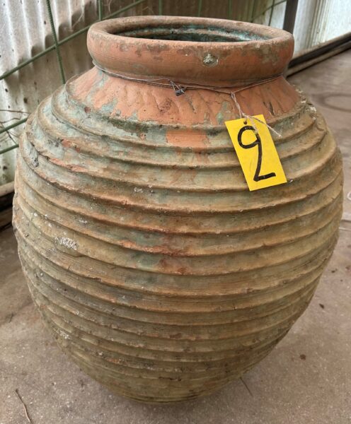 vintage Greek Peloponesian oil jar with a weathered green patina