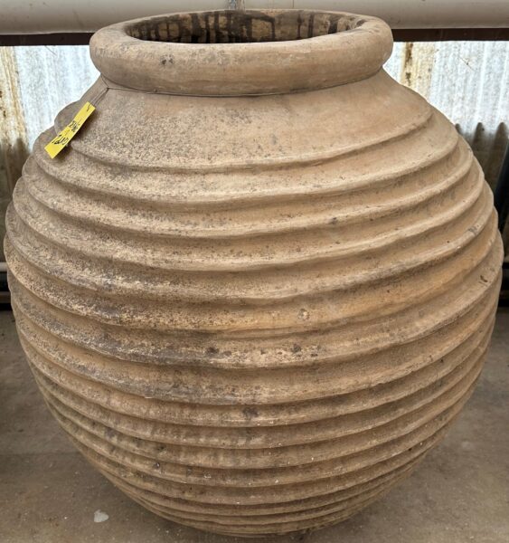vintage Greek Peloponesian oil jar with a lightly weathered patina