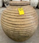 vintage Greek Peloponesian oil jar with a lightly weathered patina