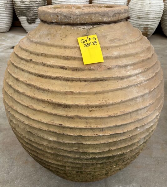 vintage Greek Peloponesian oil jar with a lightly weathered patina
