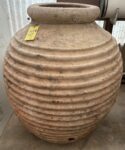 vintage Greek Peloponesian oil jar with a weathered patina