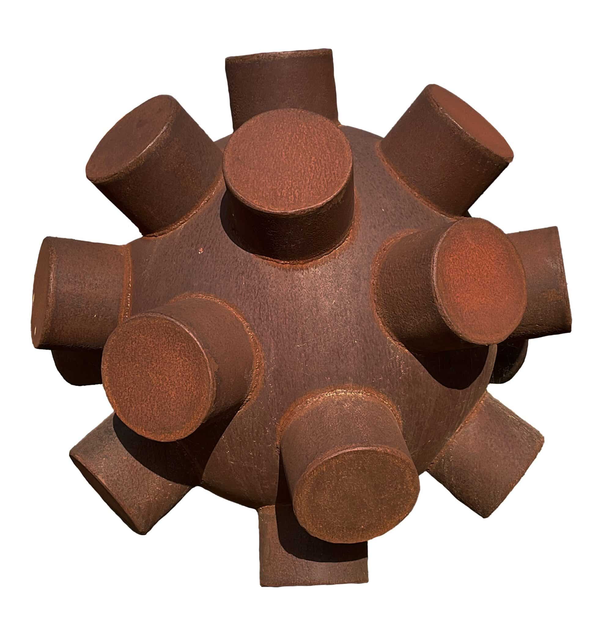 Spherical rusted steel sculpture studded with cylindrical button-like protrusions radiating outward