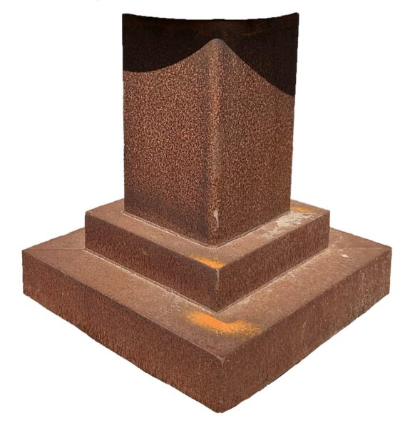 Square tapered rusted steel pedestal on a stepped base, wider at the bottom