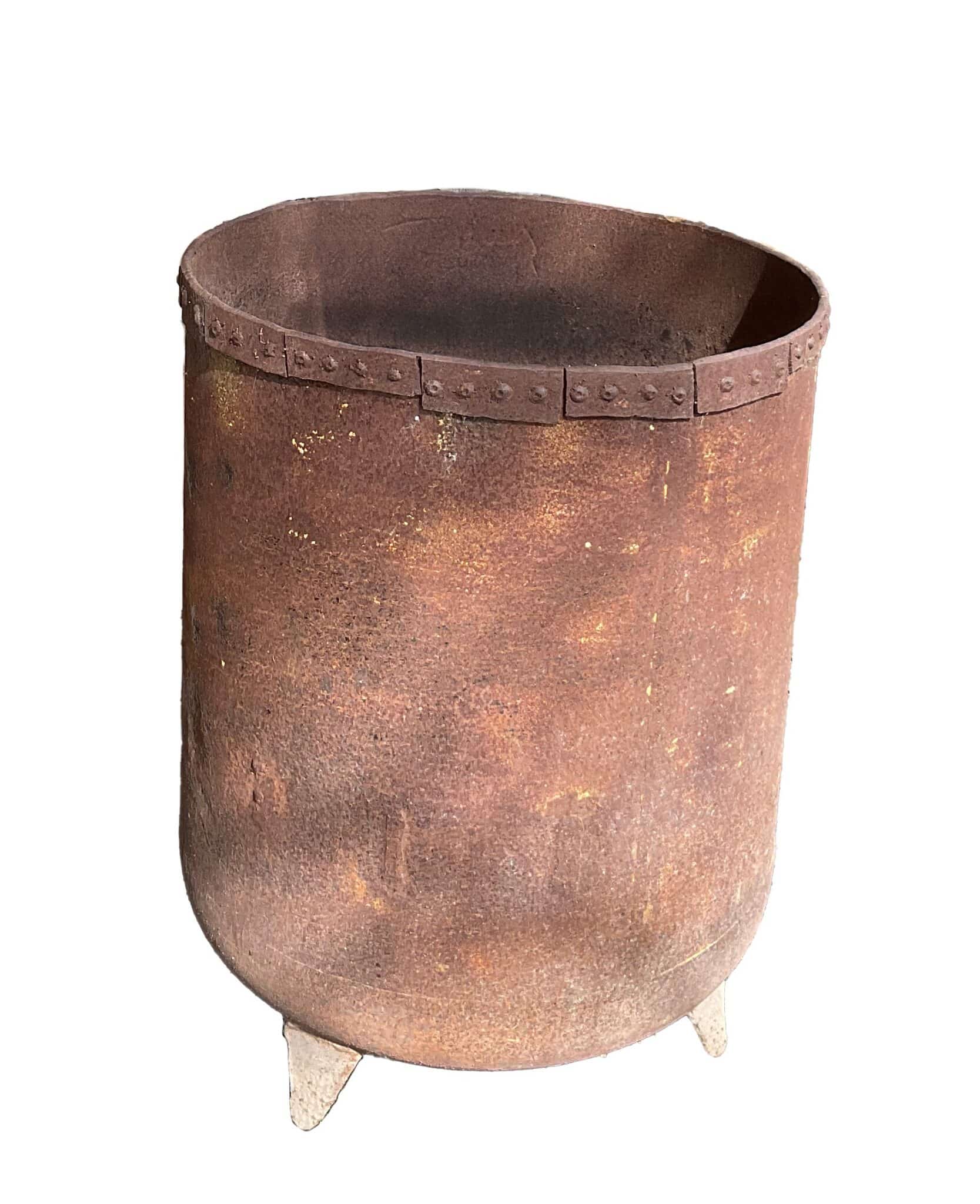 Tall round up-cycled metal planter with a riveted rim band, rust patina, and small triangular feet.