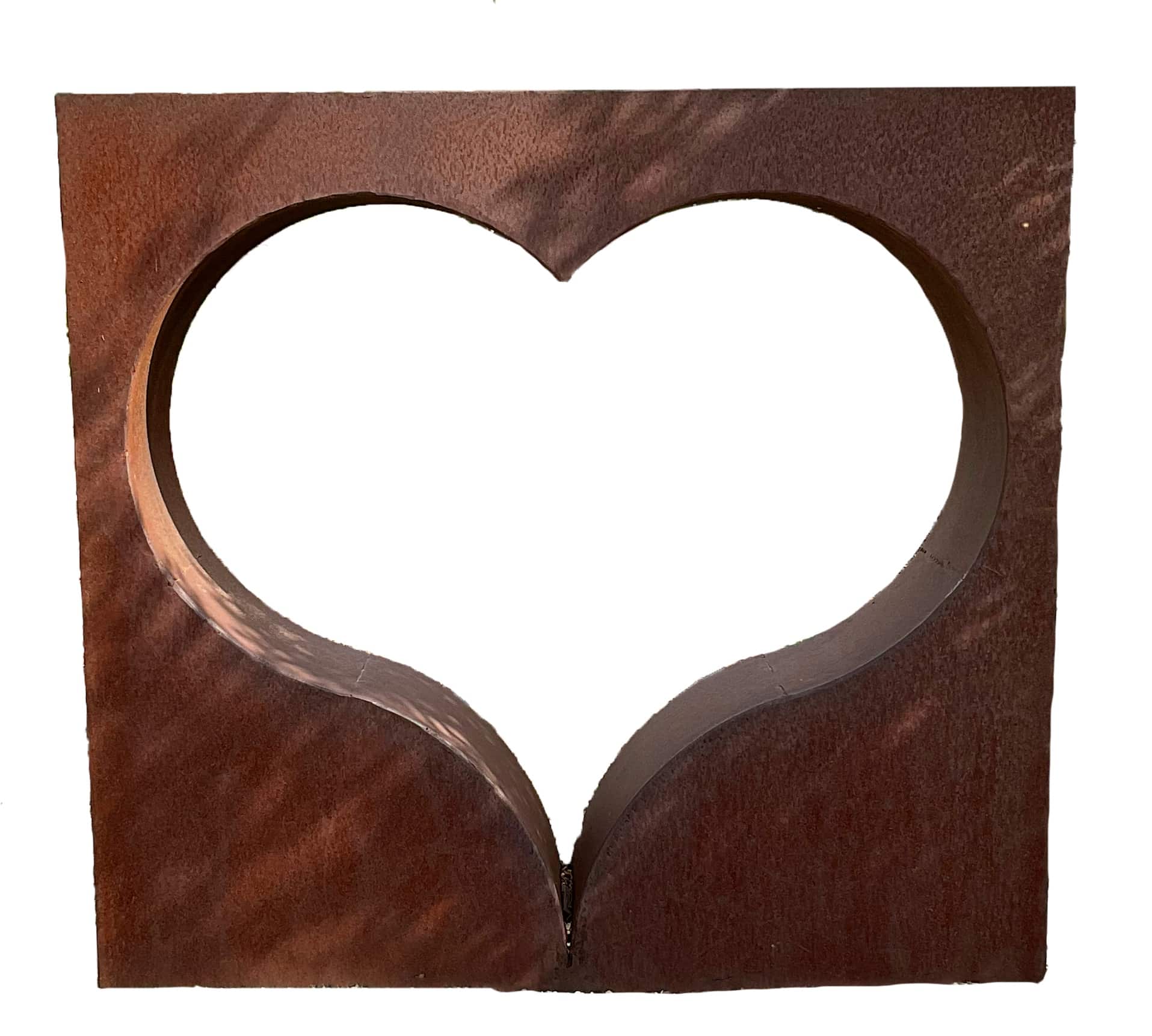 Rusted steel square with a heart-shaped cutout