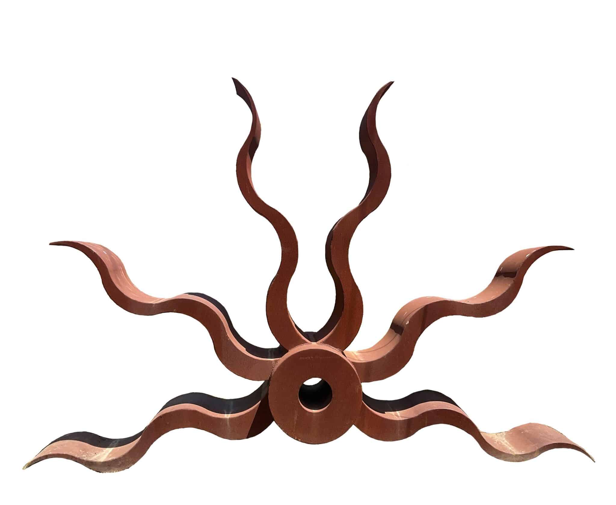 Rusted steel starburst sculpture with wavy flame-like rays radiating from a central open ring