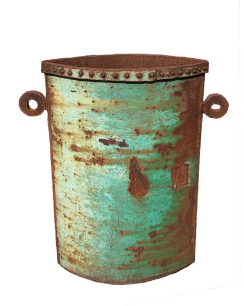 Tall cylindrical up-cycled metal planter with turquoise patina, and circular loop handles on each side.