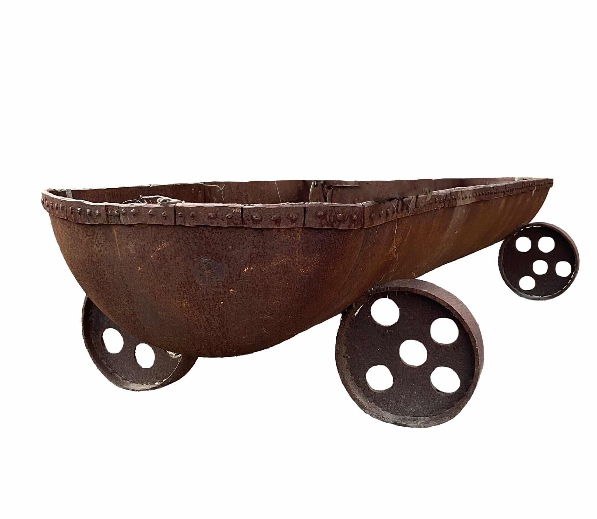 Boat-shaped rusted steel planter with riveted rim and four large perforated wheel-like feet